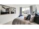 Comfortable bedroom featuring neutral tones, soft textures, and a view of the neighborhood at 1067 Marston Ln, Avon, IN 46123