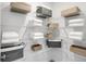Spacious walk-in closet features bright white shelving with folded towels and decorative baskets for storage at 1067 Marston Ln, Avon, IN 46123