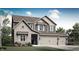 Charming two-story home with a three car garage, beautiful landscaping, and a welcoming entrance at 1067 Marston Ln, Avon, IN 46123