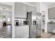 Modern kitchen design showcasing gray cabinets and stainless steel refrigerator at 1067 Marston Ln, Avon, IN 46123