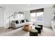 Bright living room featuring a modern sofa, decor, and a view to the neighborhood at 1067 Marston Ln, Avon, IN 46123
