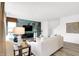 Comfortable living room with modern decor, statement wall, and plenty of natural light at 1067 Marston Ln, Avon, IN 46123