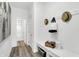 Mudroom features a built-in bench, storage, and hat hooks at 1067 Marston Ln, Avon, IN 46123
