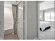 View of the bathroom and bedroom showing a bright space with modern fixtures and a tub-shower combination at 1075 Marston Ln, Avon, IN 46123