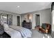 Comfortable main bedroom features dresser, stylish chair, and tasteful decor at 1127 Marston Ln, Avon, IN 46123