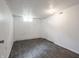 A clean, unfinished basement features painted block walls and durable gray flooring, ready for your personal touch at 1132 Sharon Ave, Indianapolis, IN 46222