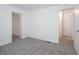 Bedroom featuring a double closet for storage, and access to other rooms at 1132 Sharon Ave, Indianapolis, IN 46222