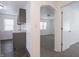 A room with an open archway featuring gray kitchen cabinets in the background at 1132 Sharon Ave, Indianapolis, IN 46222