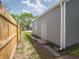 The side of the yard is clean with a wooden fence. and a house at 1132 Sharon Ave, Indianapolis, IN 46222