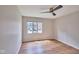Bright bedroom with hardwood floors, light walls and a large window at 1142 Canterbury S Sq # B, Indianapolis, IN 46260
