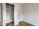 Bedroom closet featuring ample storage space with light walls and hardwood floors at 1142 Canterbury S Sq # B, Indianapolis, IN 46260