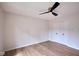 Bedroom featuring a modern ceiling fan, light walls, and double door closet at 1142 Canterbury S Sq # B, Indianapolis, IN 46260