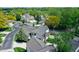 Beautiful aerial view of a residential neighborhood with mature trees and well-maintained homes at 11614 Buttonwood Dr, Carmel, IN 46033