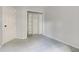 Bedroom with carpet flooring and closet with built-in shelving at 11614 Buttonwood Dr, Carmel, IN 46033