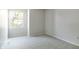 Bright, carpeted bedroom featuring a single window at 11614 Buttonwood Dr, Carmel, IN 46033