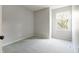 Bedroom featuring a window with neutral colored carpet at 11614 Buttonwood Dr, Carmel, IN 46033