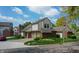 Charming two-story home with a brick and siding exterior, attached garage, and nicely landscaped yard at 11614 Buttonwood Dr, Carmel, IN 46033