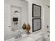 Bright bathroom featuring white vanity with quartz countertop, framed art and a shower/tub combo at 11929 Vale St, Indianapolis, IN 46235