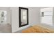 Bedroom featuring a mirror, window with blinds, and neutral decor at 11929 Vale St, Indianapolis, IN 46235