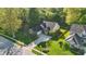 Beautiful aerial view of home featuring a manicured lawn, mature trees, and neighborhood at 12065 Gray Eagle Dr, Fishers, IN 46037
