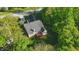 Home aerial featuring a large back deck surrounded by mature trees at 12065 Gray Eagle Dr, Fishers, IN 46037