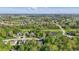 Community aerial view including pond, green areas and surrounding homes at 12065 Gray Eagle Dr, Fishers, IN 46037
