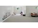 Unfinished basement space with ample potential, large window and butterfly decals at 12065 Gray Eagle Dr, Fishers, IN 46037