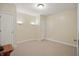 Cozy bedroom with neutral carpet, recessed lighting, and ample closet space at 12065 Gray Eagle Dr, Fishers, IN 46037