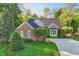 Charming brick home with manicured lawn and mature landscaping, offering great curb appeal at 12065 Gray Eagle Dr, Fishers, IN 46037