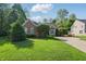 Charming brick home with manicured lawn and mature trees, offering great curb appeal and privacy at 12065 Gray Eagle Dr, Fishers, IN 46037