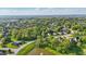 Scenic view of community pond surrounded by mature green trees at 12065 Gray Eagle Dr, Fishers, IN 46037