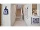 Carpeted staircase with white walls, leading to the upper level, providing easy access at 12065 Gray Eagle Dr, Fishers, IN 46037