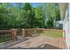 Large wooden deck with railings and steps, offering an inviting outdoor space for relaxation and entertainment at 12065 Gray Eagle Dr, Fishers, IN 46037