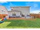 Spacious backyard with a wooden deck featuring outdoor furniture, a grill, and a play area at 1289 Sunset Blvd, Avon, IN 46123