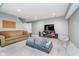 Finished basement with gray carpeting, multiple seating areas, and a TV entertainment space at 13131 Conner Knoll Pkwy, Fishers, IN 46038