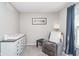 Charming Bedroom with a dresser, chair, side table, and picture frame at 13131 Conner Knoll Pkwy, Fishers, IN 46038