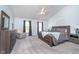 Serene main bedroom with vaulted ceilings, neutral decor, and comfortable furnishings at 13131 Conner Knoll Pkwy, Fishers, IN 46038