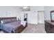 Well-lit main bedroom featuring a spacious layout with an ensuite bathroom at 13131 Conner Knoll Pkwy, Fishers, IN 46038