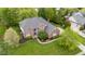 Bird's eye view of a brick home on a spacious lot with mature landscaping at 13248 Blacktern Way, Carmel, IN 46033