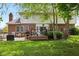 Picturesque backyard features a patio with grill, dining and lounge seating areas at 13248 Blacktern Way, Carmel, IN 46033