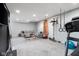 Basement living area with workout area. Featuring a comfortable couch and fitness equipment at 13248 Blacktern Way, Carmel, IN 46033