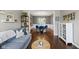 Open living area with hardwood floors and view to the dining area at 13248 Blacktern Way, Carmel, IN 46033