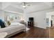 Spacious main bedroom featuring vaulted ceilings, natural light, and hardwood flooring at 13248 Blacktern Way, Carmel, IN 46033
