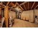 Unfinished basement with exposed pipes, concrete foundation, and mechanical equipment, ready for customization at 1334 Legacy Ct, Indianapolis, IN 46234