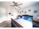 Comfortable bedroom featuring a full bed with inviting linens and ceiling fan at 1334 Legacy Ct, Indianapolis, IN 46234
