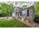 Charming home with brick accents, landscaping, and well-manicured lawn at 1334 Legacy Ct, Indianapolis, IN 46234