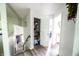 Hallway features a closet with shelving, offering storage space for linens and household items at 1334 Legacy Ct, Indianapolis, IN 46234