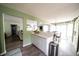 Bright kitchen view with adjacent dining area and open layout, perfect for entertaining at 1334 Legacy Ct, Indianapolis, IN 46234