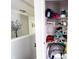 A well-organized linen closet with shelves, offering ample storage space for linens and essentials at 1334 Legacy Ct, Indianapolis, IN 46234