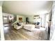 Spacious living room with hardwood floors, a fireplace, and an open layout at 1334 Legacy Ct, Indianapolis, IN 46234